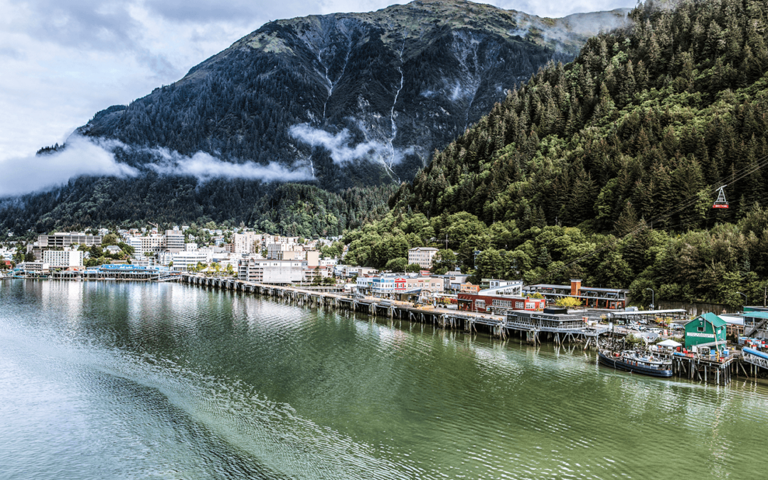 Aerial view of Juneau, Alaska with waterfront and mountain backdrop