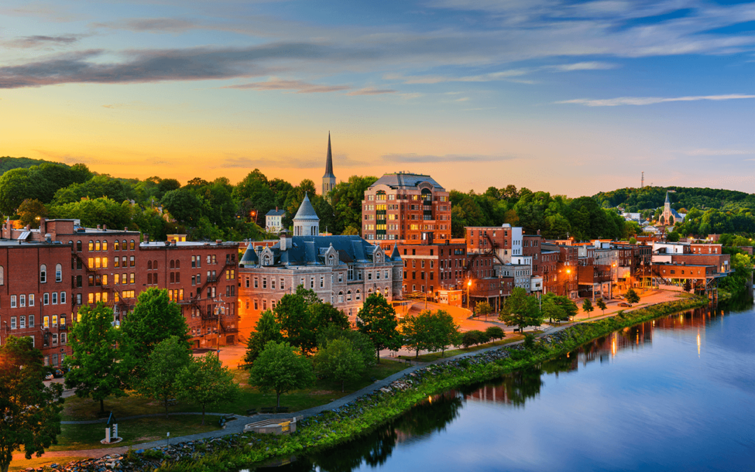 Scenic view of Augusta, Maine at sunset along the Kennebec River.