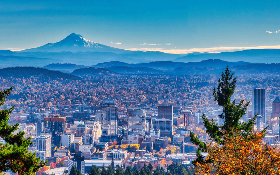 A vibrant view of Portland with Mount Hood in the background on a clear, autumn day.